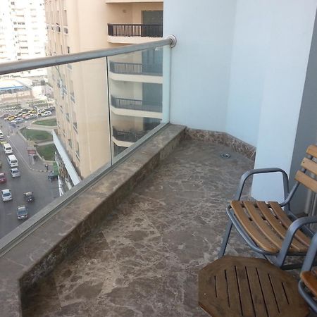 Hilton Alexandria Corniche Hotel Exterior foto A balcony in a residential building in Cairo, Egypt